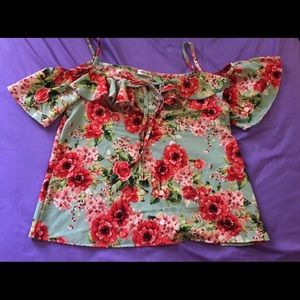 Off the shoulder floral shirt! Size: medium or L
